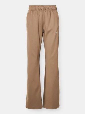 Spodnie treningowe Nike brązowy