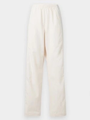 Spodnie treningowe Nike mleczny