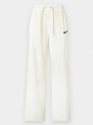 Spodnie treningowe Nike mleczny