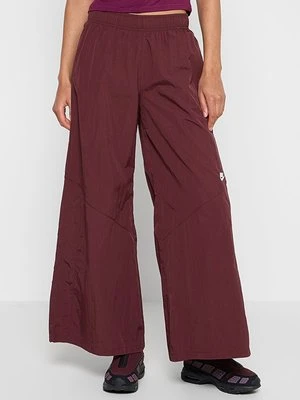 Spodnie treningowe Nike ciemnoczerwony