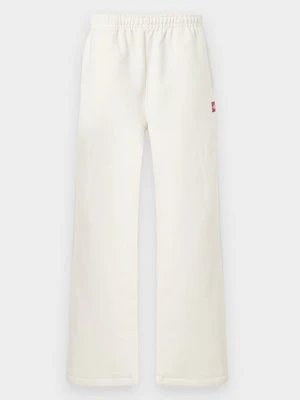 Spodnie treningowe The North Face mleczny