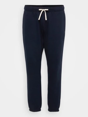 Spodnie treningowe Tommy Hilfiger granatowy