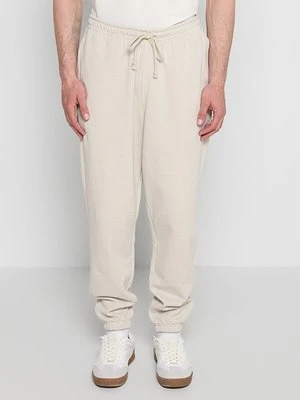 Spodnie treningowe Tommy Jeans beżowy