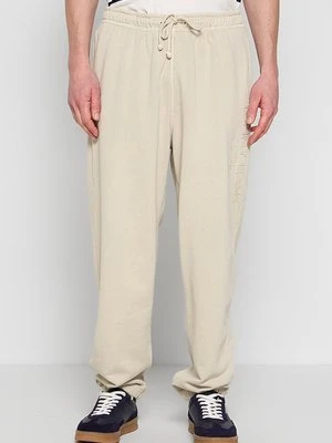 Spodnie treningowe Tommy Jeans beżowy