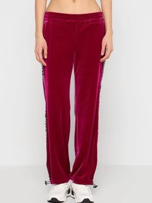 Spodnie treningowe Versace Jeans Couture czerwony