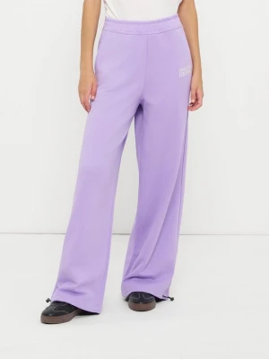 Spodnie treningowe Versace Jeans Couture liliowy