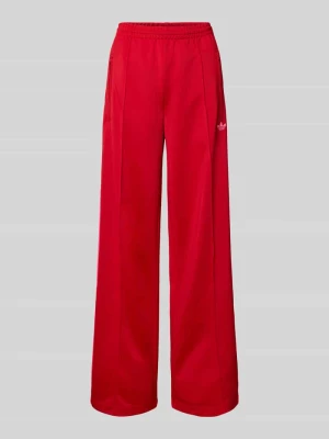 Spodnie treningowe z elastycznym pasem i wyhaftowanym logo adidas Originals