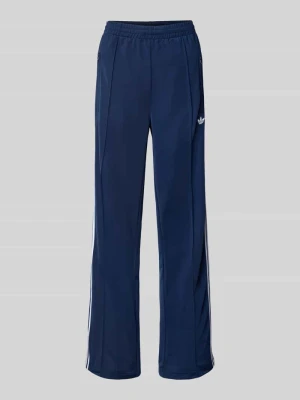 Spodnie treningowe z logo i elastycznym pasem model ‘FIREBIRD’ adidas Originals