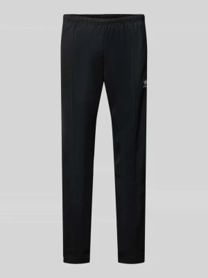 Spodnie treningowe z wyhaftowanym logo model ‘BECKENBAUER’ adidas Originals