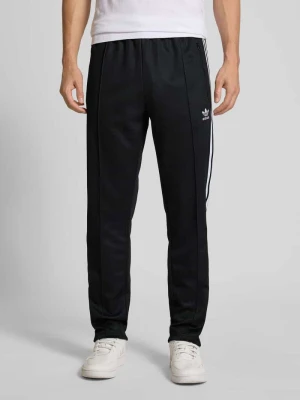 Spodnie treningowe ze szwami podłużnymi i elastycznym pasem adidas Originals