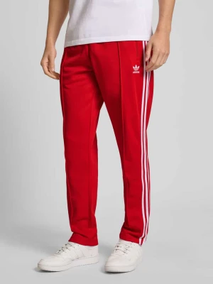 Spodnie treningowe ze szwami podłużnymi i elastycznym pasem adidas Originals