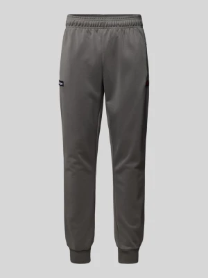 Spodnie typu track pants o kroju tapered fit z naszywką z logo model ‘BERTONI’ Ellesse