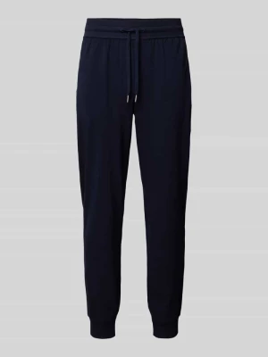 Spodnie typu track pants o kroju tapered fit z tunelem Tommy Hilfiger