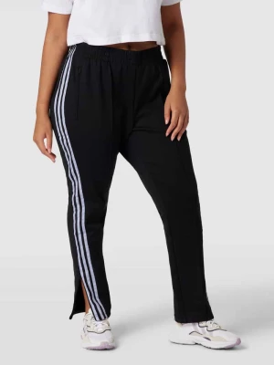 Spodnie typu track pants PLUS SIZE z wyhaftowanym logo Adidas Originals Plus