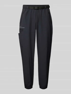 spodnie typu track pants z kieszeniami zapinanymi na zamek błyskawiczny model 'HALO MOVE'