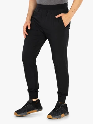 Spodnie Under Armour Unstoppable Joggers - black/pitch gray