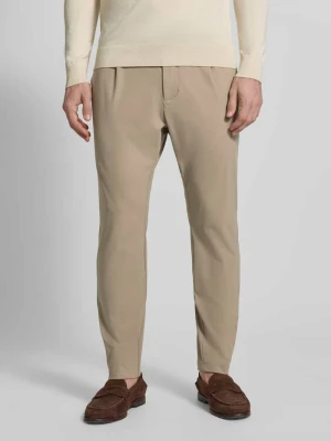 Spodnie w kroju slim fit z kieszeniami z lamówką na pośladkach CRUNA