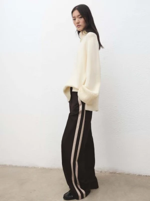 Spodnie wide leg z kontrastowym paskiem czekoladowy - Kobieta - - MANGO