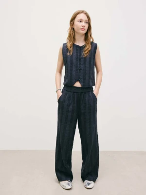 Spodnie z bawełny z haftem granatowy - Dzieci - lata - MANGO KIDS