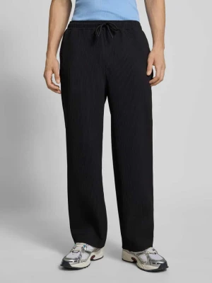 Spodnie z elastycznym pasem i trokami ściągającymi REVIEW