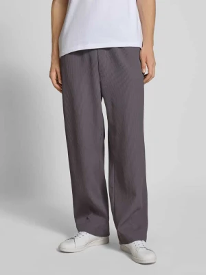 Spodnie z elastycznym pasem i trokami ściągającymi REVIEW