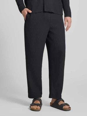 Spodnie z elastycznym paskiem w plisowanym wyglądzie REVIEW