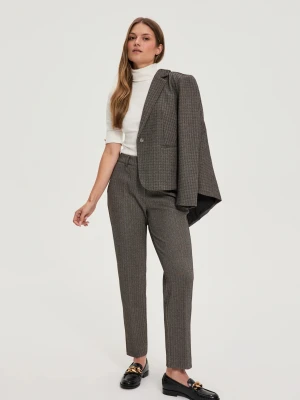 Spodnie z metaliczną nitką ciemnobeżowe Moodo