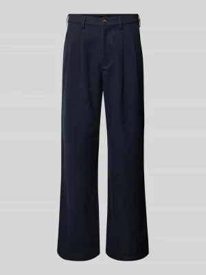 Spodnie z plisami i kieszeniami z tyłu PROHIBITED