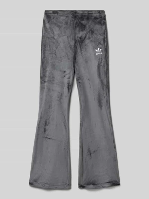 Spodnie z poszerzaną nogawką i wyhaftowanym logo adidas Originals