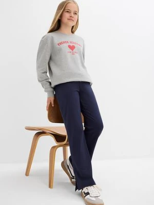 Spodnie z poszerzaną nogawką z mieszanki bawełny organicznej z rozcięciami po bokach bonprix