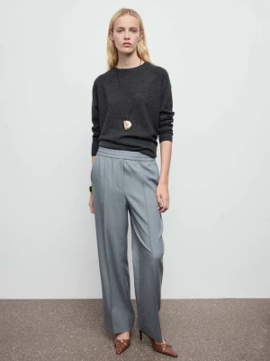 Spodnie z szerokimi nogawkami i elastycznym pasem szary - Kobieta - - MANGO