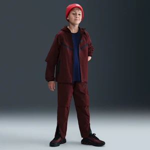 Spodnie z tkaniny dla dużych dzieci (chłopców) Nike Tech - Czerwony