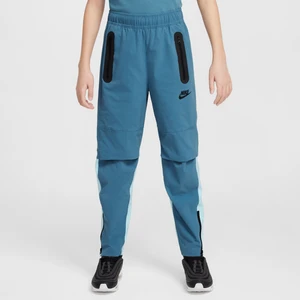 Spodnie z tkaniny dla dużych dzieci (chłopców) Nike Tech - Niebieski