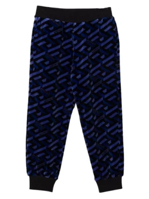 Spodnie z wzorem all-over Versace