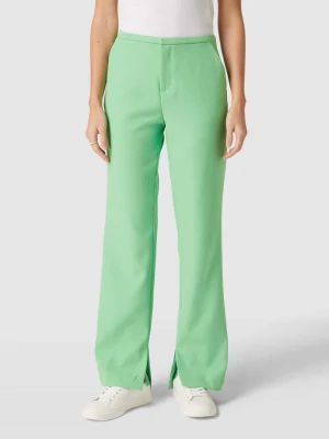 Spodnie z zakładkami w pasie i wpuszczanymi kieszeniami w stylu francuskim model ‘JANE’ Gina Tricot
