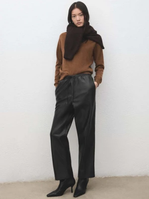 Spodnie ze sztucznej skóry z gumką w pasie czarny - Kobieta - - MANGO