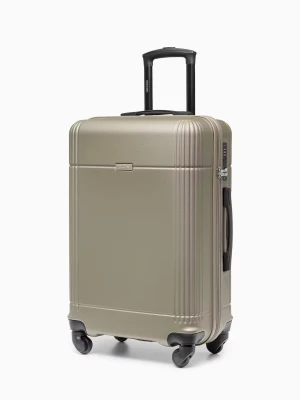 Średnia walizka z abs-u szampańska Puccini