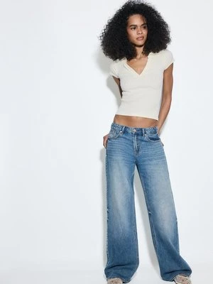 Stradivarius D91 Jeansy z niskim stanem i szerokimi nogawkami  ŚREDNI NIEBIESKI DENIM