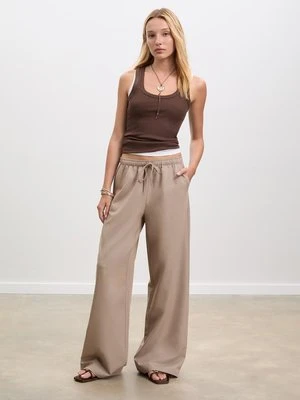 Stradivarius Długie, zwiewne spodnie wizytowe  Szary