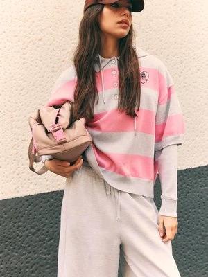 Stradivarius Dzianinowy sweter polo Bugs Bunny  Pastelowy róż