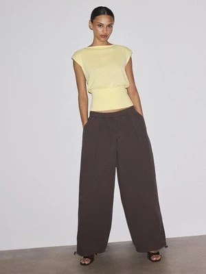 Stradivarius Dzianinowy top z paskiem  Żółty pastelowy