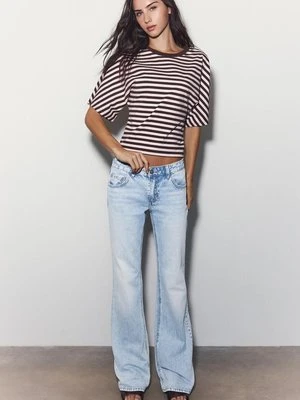 Stradivarius Dżinsy bootcut z niskim stanem  ŚREDNIOJASNY NIEBIESKI DENIM