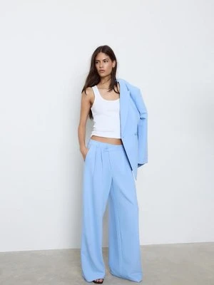 Stradivarius Eleganckie spodnie z krzyżowanym pasem  Jasnobłękitny