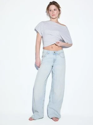 Stradivarius Jeans niski stan szerokie nogawki gwiazda  ŚREDNIOJASNY NIEBIESKI DENIM