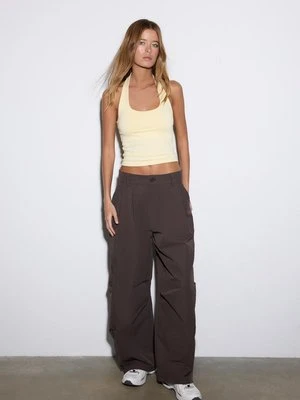 Stradivarius Koszulka z dekoltem halter  Żółty pastelowy