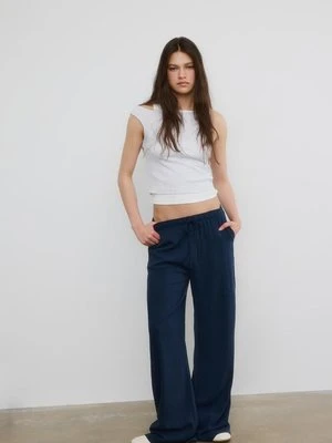 Stradivarius Luźne spodnie z efektem lnu  Ciemnomorski