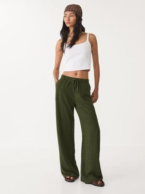 Stradivarius Luźne spodnie z lnem  0-525