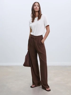 Stradivarius Luźne spodnie z lnem i wiązaniem  Brązowy