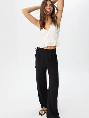 Stradivarius Luźne spodnie z lnem i wiązaniem  Czarny