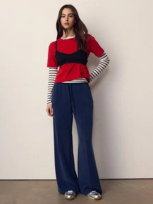 Stradivarius Miękkie spodnie jogger z szerokimi nogawkami i przeszyciami  Morski